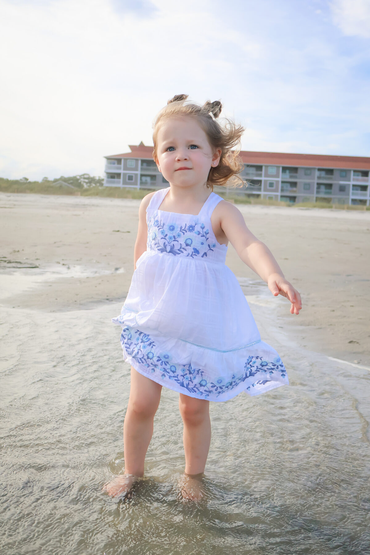 Little one playing in the surf
